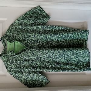 A Walter Hagen 11 Majors Shirt size small color green and dark blue.